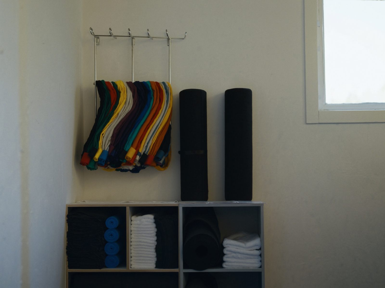Resistance bands, foam rollers and mats in a therapy space