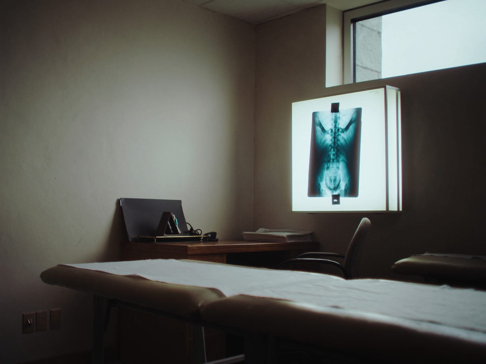 A spine x-ray on a light box in a chiropractic clinic
