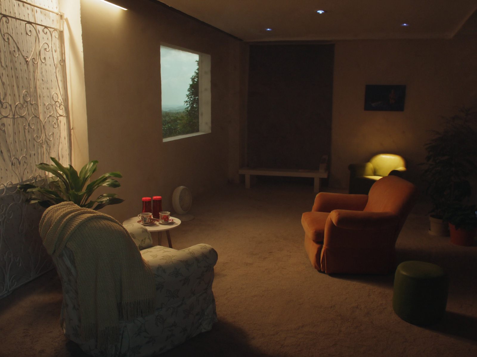 Two armchairs facing each other with a small table