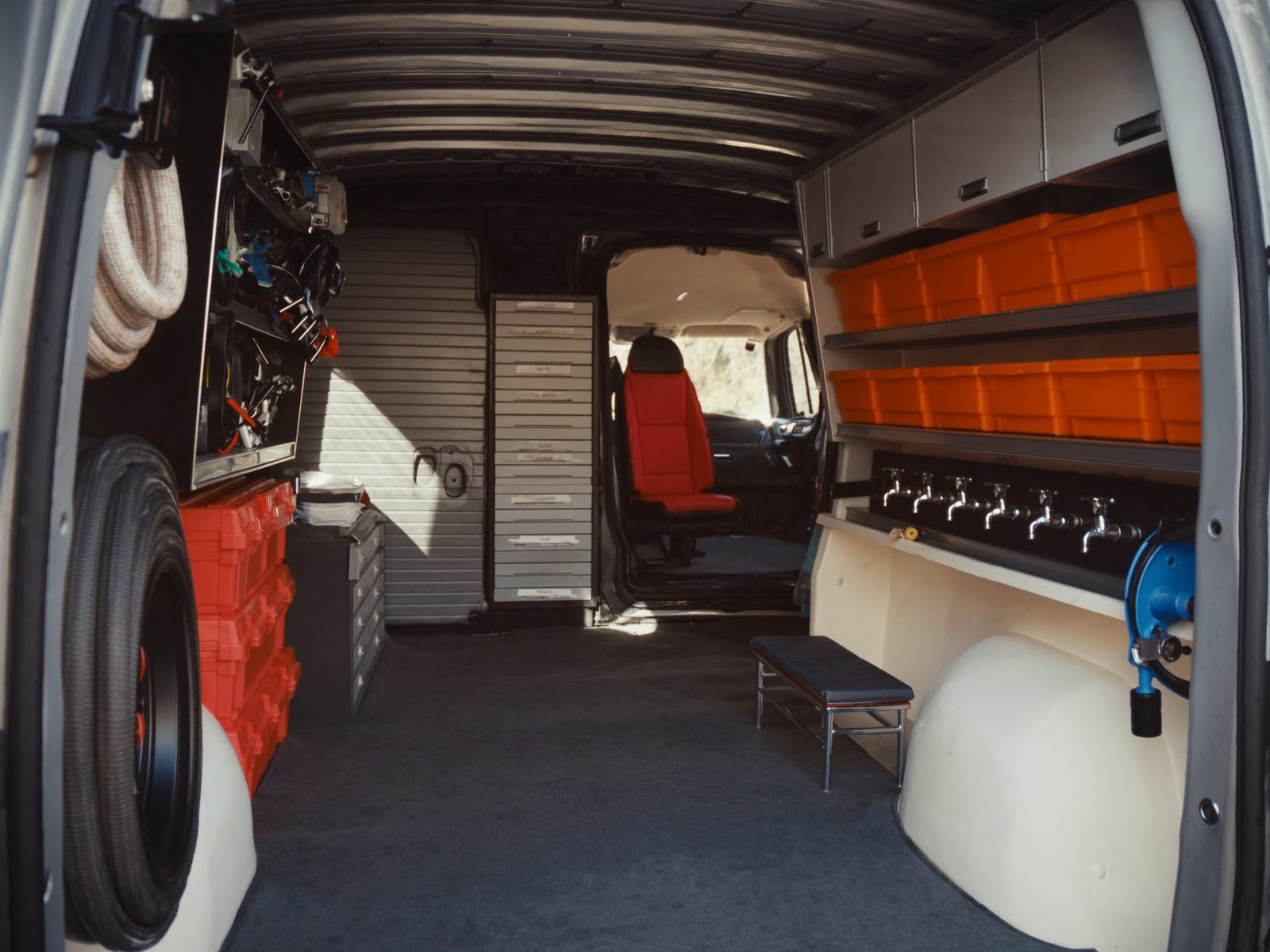 The organized interior of a plumbing service van