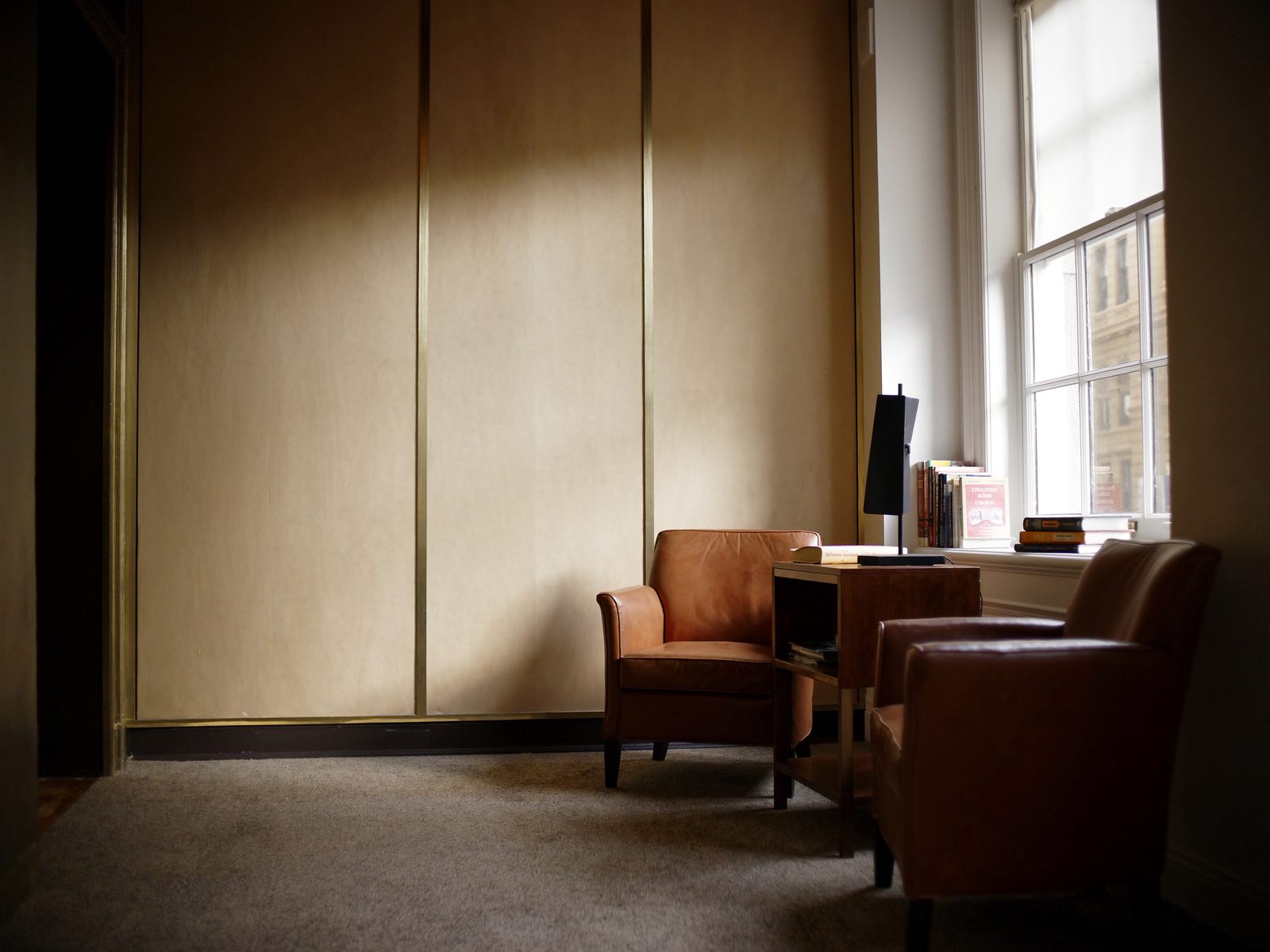 A law firm reception with leather chairs